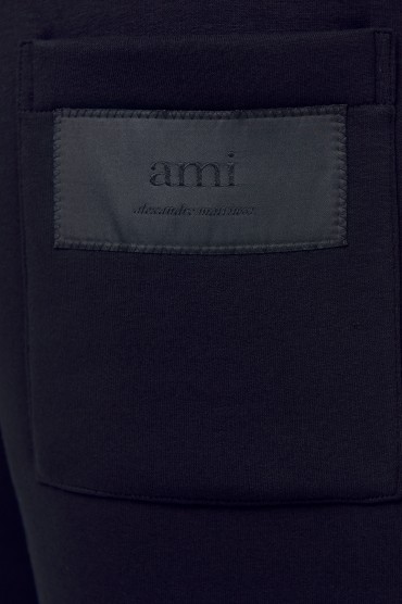 Брюки джогери з логотипом AMI PARIS AMIm23012